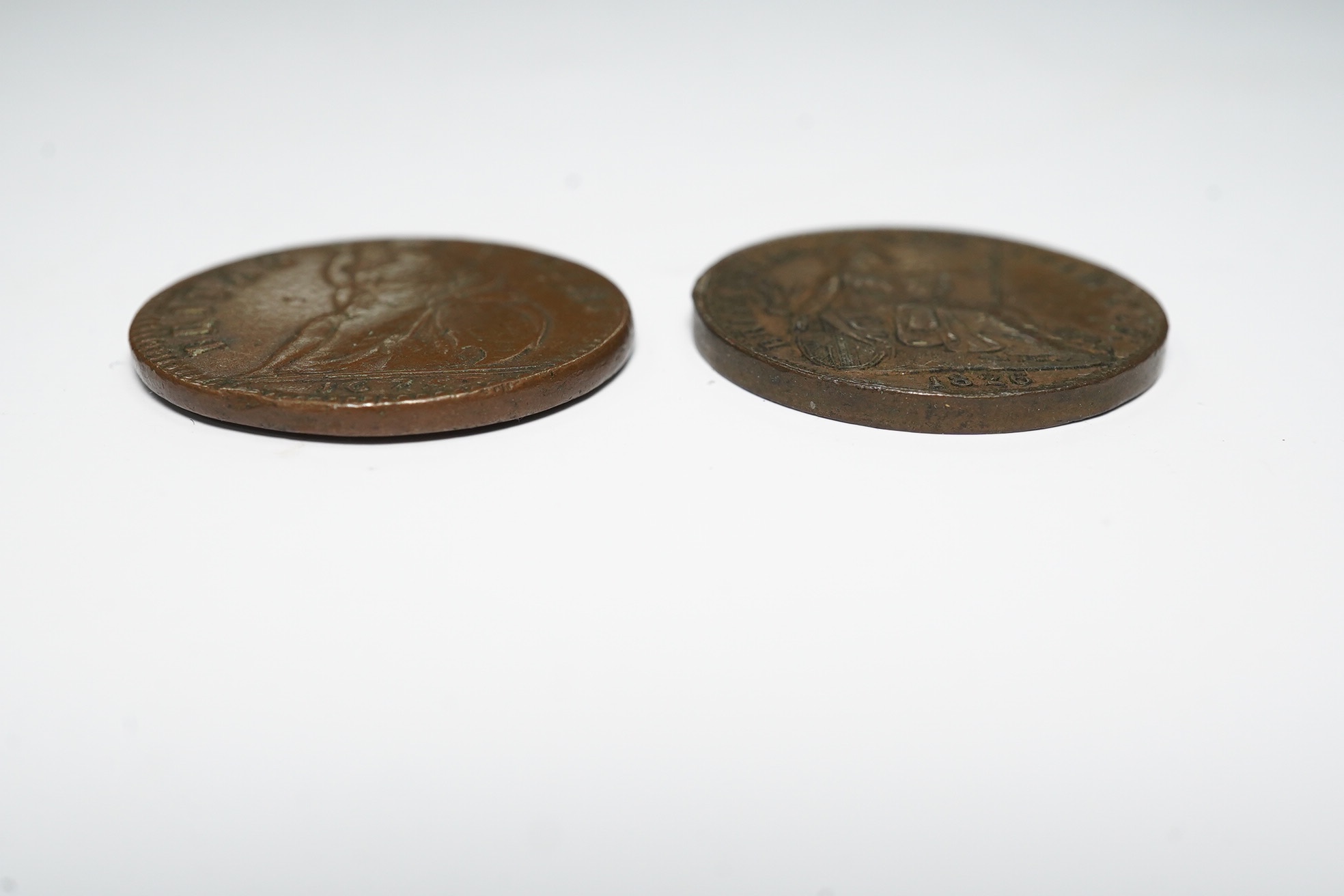 British coins, Charles II copper farthing 1675, near VF and a George IV farthing 1826, about EF